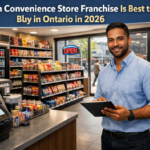 Ontario convenience store franchise interior with entrepreneur using POS system and stocked shelves, 2026 business opportunity.